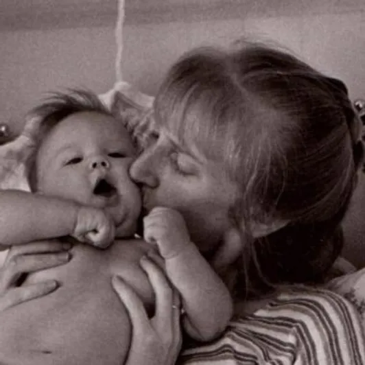 Dr Pamela Douglas with young child