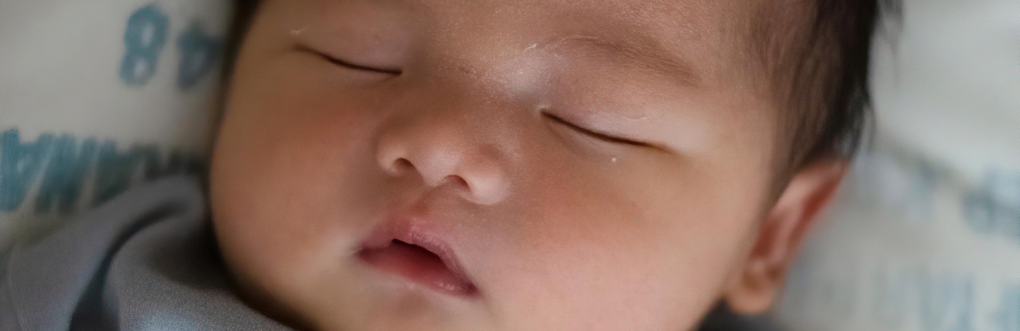 asian baby sleeping restfully