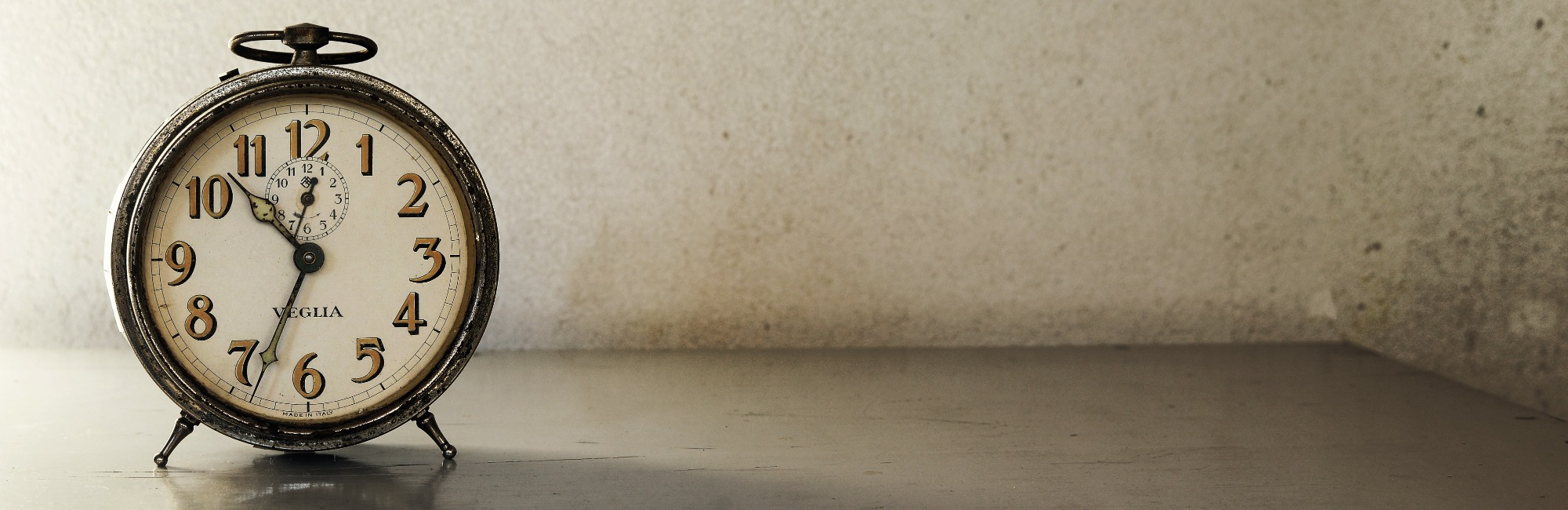 antique clock on shelf