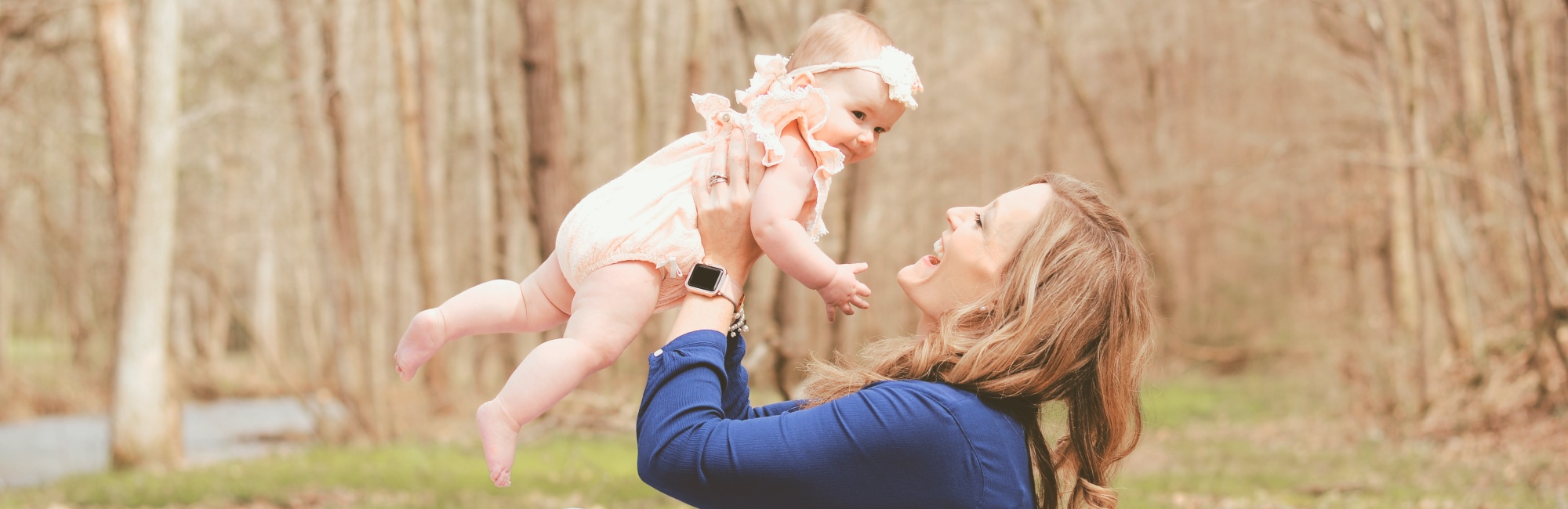 mother and baby interact in natural environment; sensory motor stimulation for baby